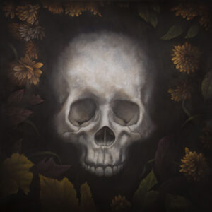 A human skull in muted color is seen against a black background with various flora situated around it