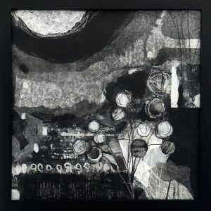A black and white abstract series of colors, large grey and white circular areas and spindly shapes