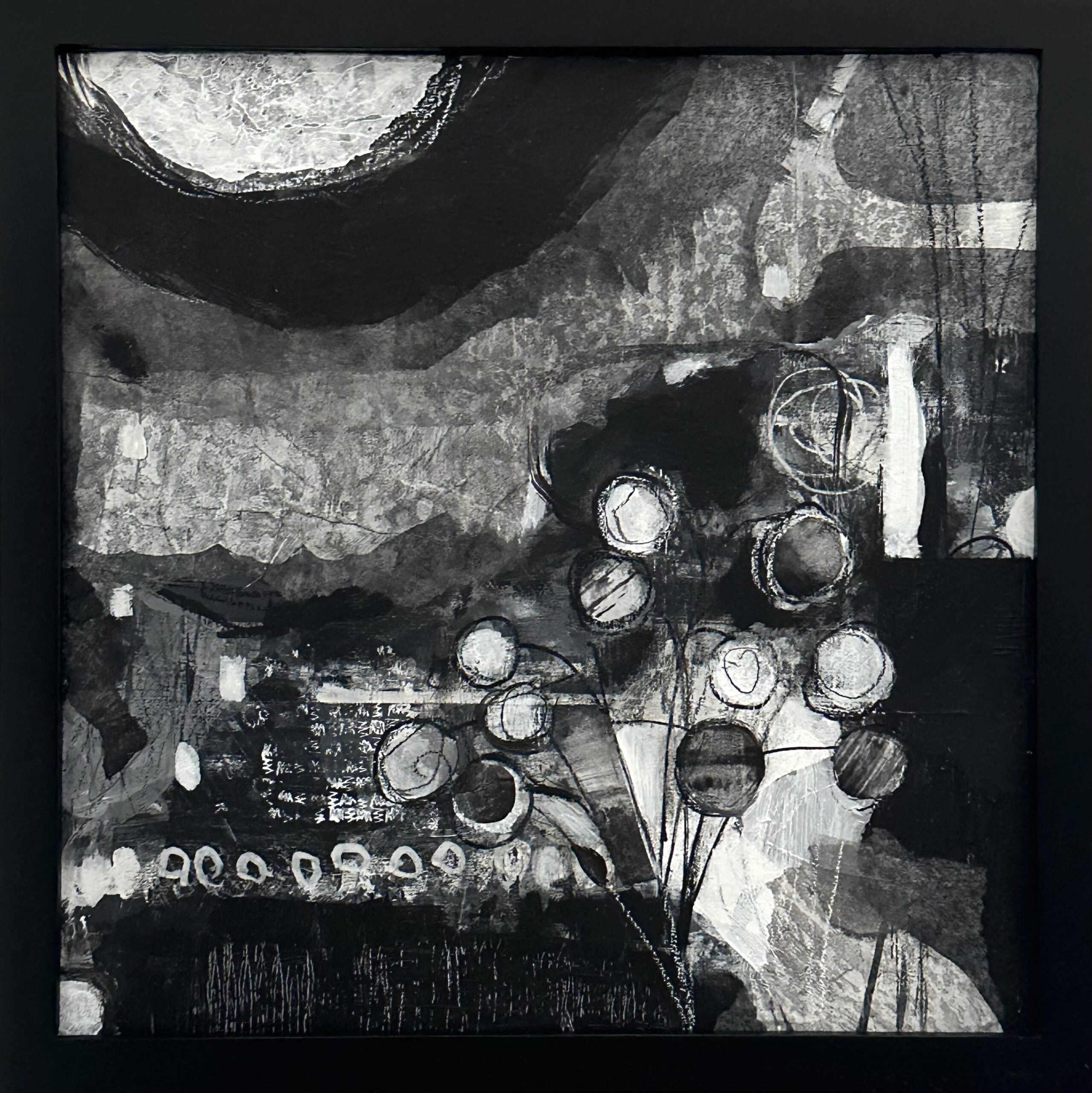 A black and white abstract series of colors, large grey and white circular areas and spindly shapes
